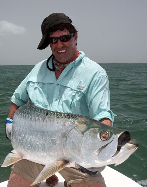 GF with a tarpon of around 150 lbs caught on CSM Cuba